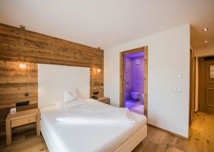 Einzelzimmer Goldknopf Deluxe mit französischem Bett