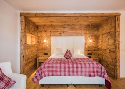 Das Doppelbett im Doppelzimmer Alpe 109